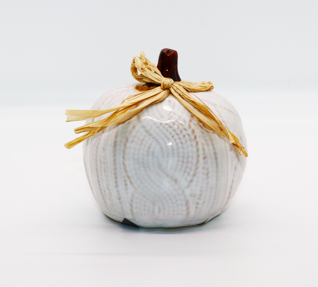 Ceramic pumpkins with knit pattern